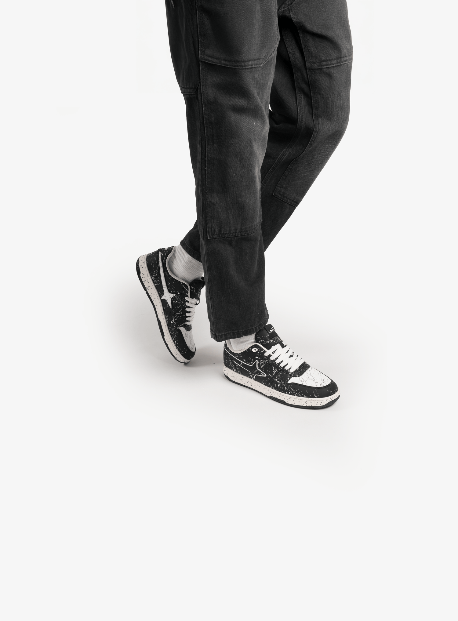 Person wearing Comet shoes on feet